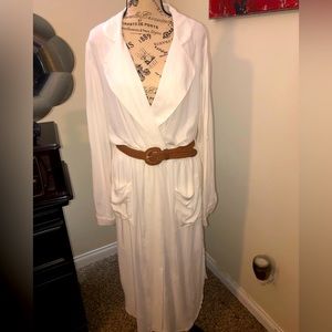 Elegant linen shirt style dress with woven leather tan belt and front pockets.